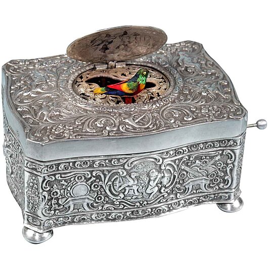 Seltene Silber-Spieldose mit piependem Vogel